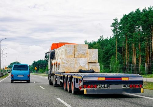imgi_19_truck-highway-road-warsaw-poland-lorry-transport-delivering-some-freight-cargo_250132-25775