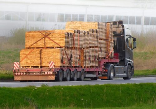 imgi_28_truck-delivering-materials-machinery-construction-site_782515-13413